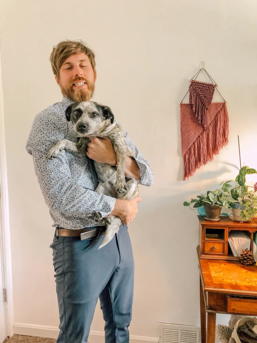 gavin law wedding films holding his dog