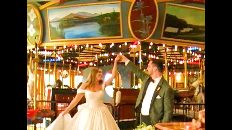 Wedding couple doing a twirling dance move at Hotel Saranac, Saranac Lake, New York